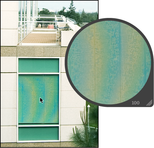 Figure. Image showing a moire pattern rainbow effect in the blinds of a window.