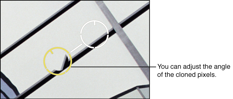Figure. Image showing a yellow Spot & Patch target overlay placed over an area of the image containing cloned pixels that need an Angle adjustment.