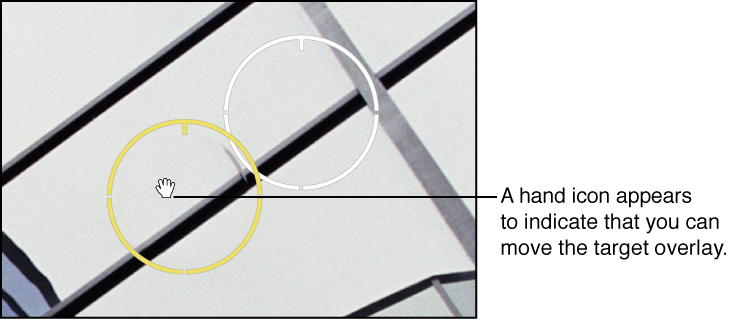 Figure. Image showing a hand icon appearing over the Spot & Patch target overlay to indicate that you can select it.