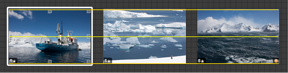 Figure. Image being dragged and yellow guidelines appearing to help visually align the image with other images in the Light Table.