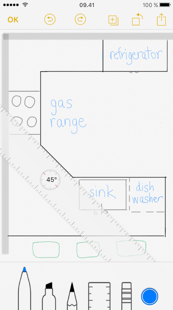 Skitse på iPhone, der viser en tegnet grundplan af et køkken med beskrivende tekster.