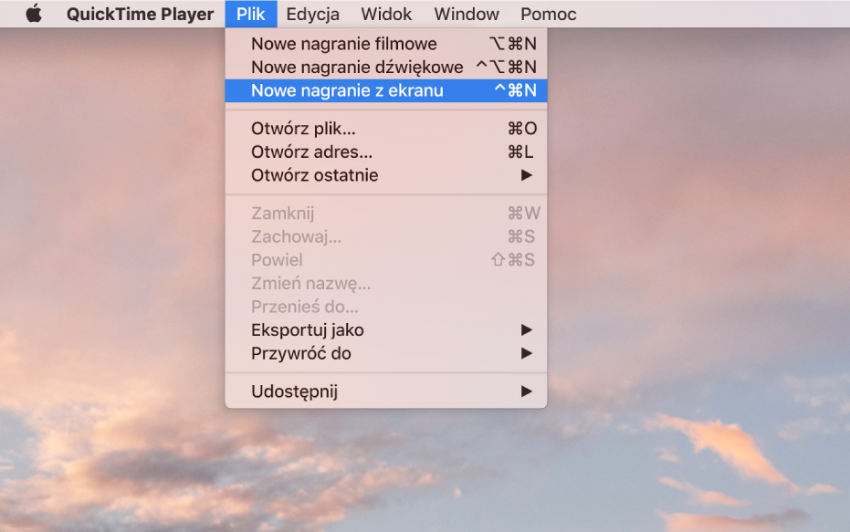 W aplikacji QuickTime Player, menu Plik jest otwarte oraz wybrane jest polecenie Nowe nagranie z ekranu w celu nagrania treści z ekranu.