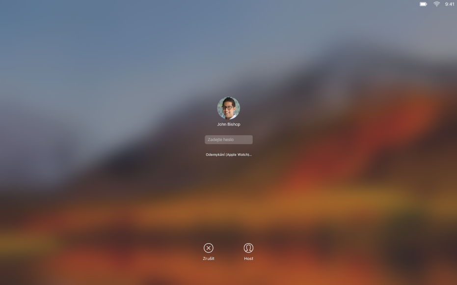 Obrazovka automatického odemknutí, na níž je uprostřed zobrazena zpráva, že Mac je právě odemykán pomocí Apple Watch