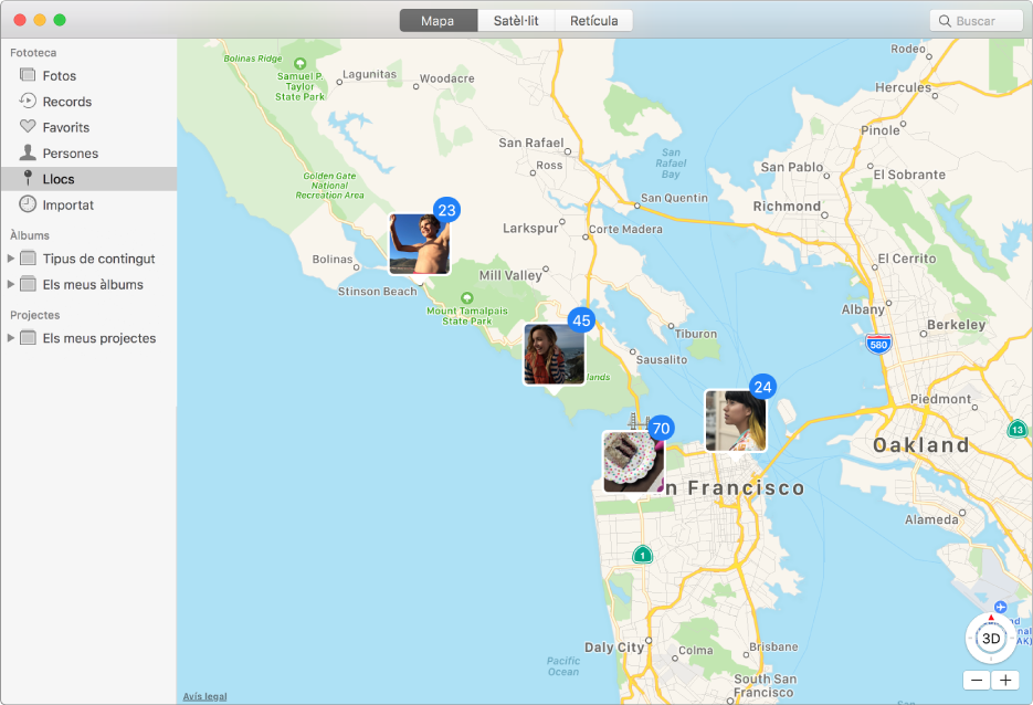 Finestra de l’app Fotos que mostra un mapa amb miniatures de fotos agrupades per ubicació.