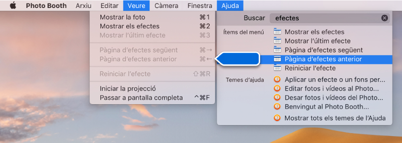 El menú Ajuda Photo Booth, amb un resultat de cerca d’una opció de menú seleccionada i una fletxa que l’assenyala als menús de l’app.