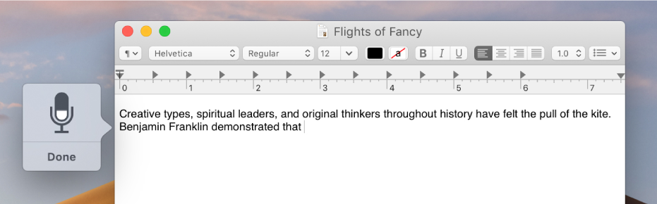 The dictation feedback window alongside dictated text in a TextEdit document.