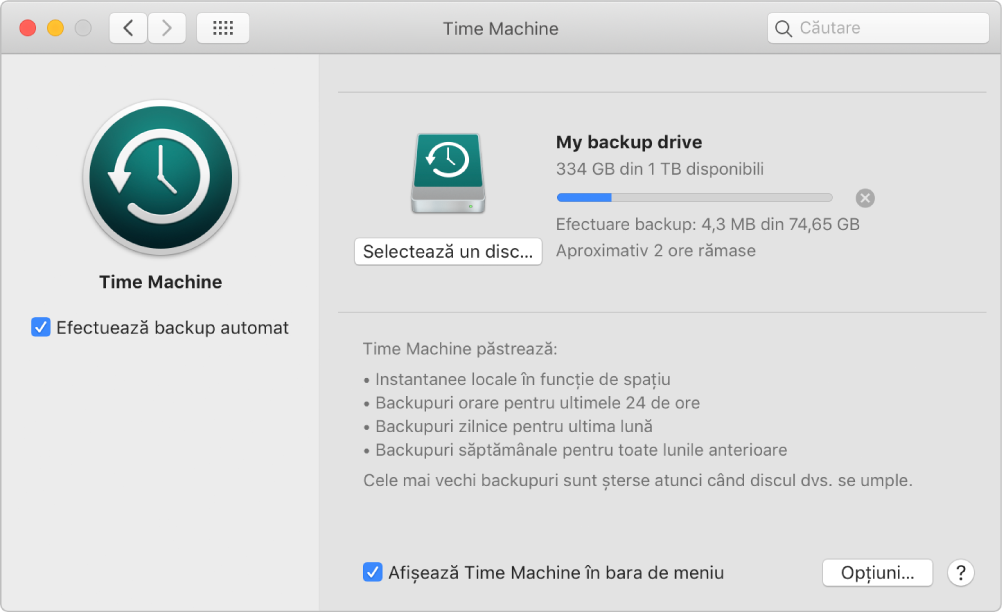 Preferințele pentru Time Machine afișând progresul backupului pe un disc extern.