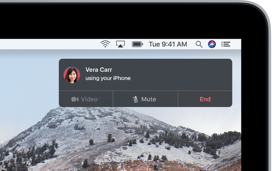 A notification appears in the upper-right corner of the Mac screen, showing that a phone call is in progress using your iPhone.