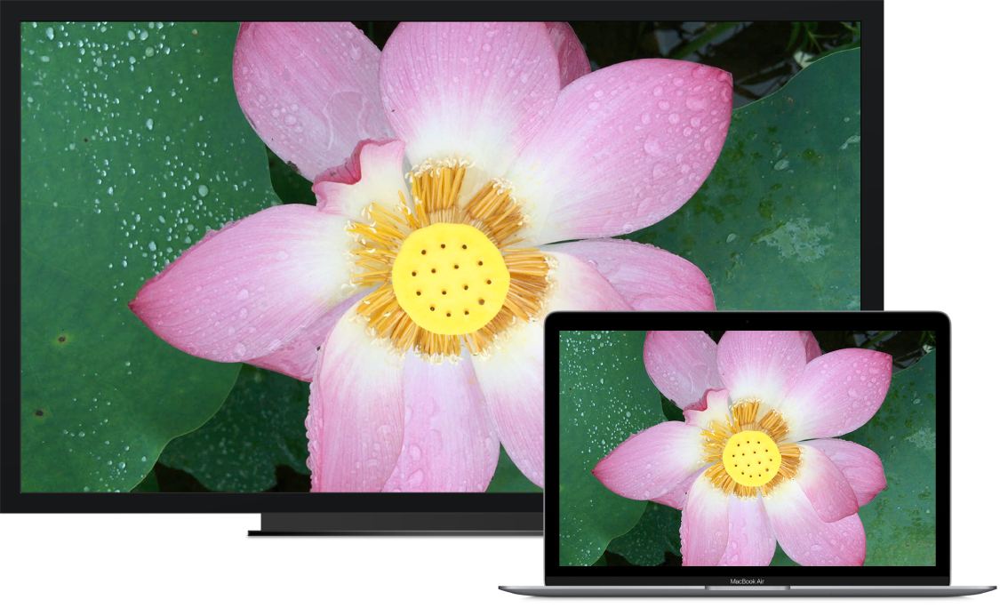 MacBook Air next to an HDTV used as an external display.