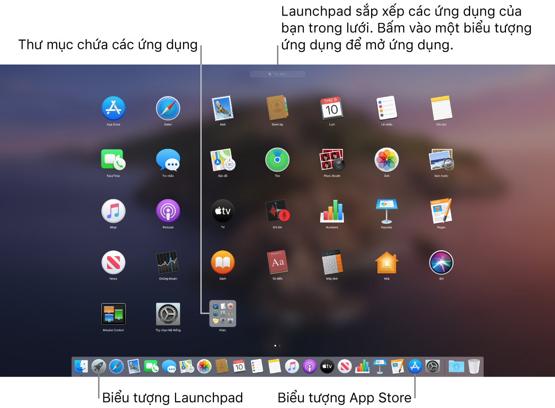 Một màn hình máy Mac với Launchpad được mở, đang hiển thị một thư mục các ứng dụng trong Launchpad, các biểu tượng Launchpad và App Store trên Dock.