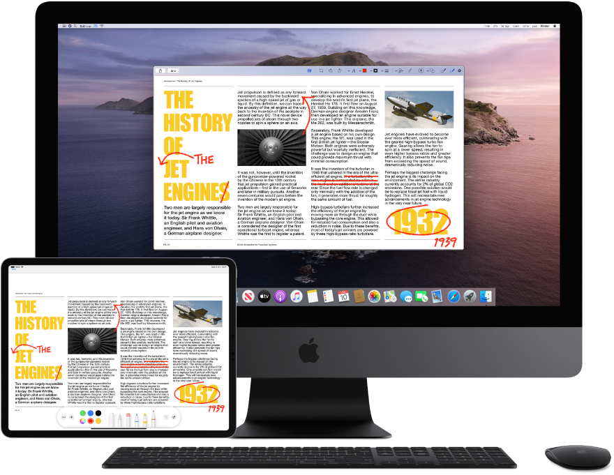 ‏iMac Pro ו-iPad מונחים זה לצד זה. שני המסכים מציגים מאמר המכוסה בתיקונים אדומים קטנים בכתב יד, כמו משפטים מחוקים בקו, חצים ומילים שנוספו. ל-iPad יש גם פקדי סימון בתחתית המסך.