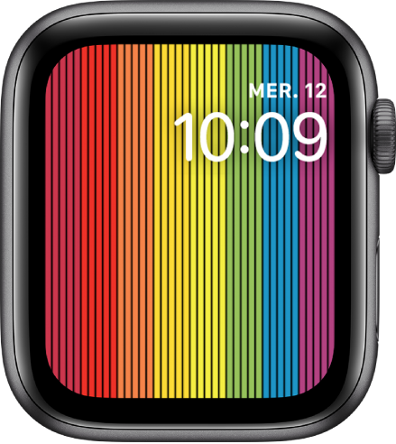 Cadran Pride numérique avec des bandes verticales aux couleurs de l’arc-en-ciel avec le jour, la date et l’heure en haut à droite.