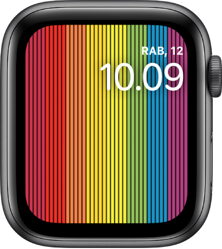 Wajah jam Pride Digital menampilkan garis pelangi vertikal dengan hari, tanggal, dan waktu di kanan atas.
