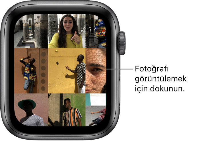 Bir ızgarada görüntülenen çok sayıda fotoğrafla birlikte Apple Watch Fotoğraflar uygulamasının ana ekranı.