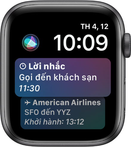 Mặt đồng hồ Siri, đang hiển thị tiêu đề tin tức và giá chứng khoán. Nút Siri ở trên cùng bên trái của màn hình.