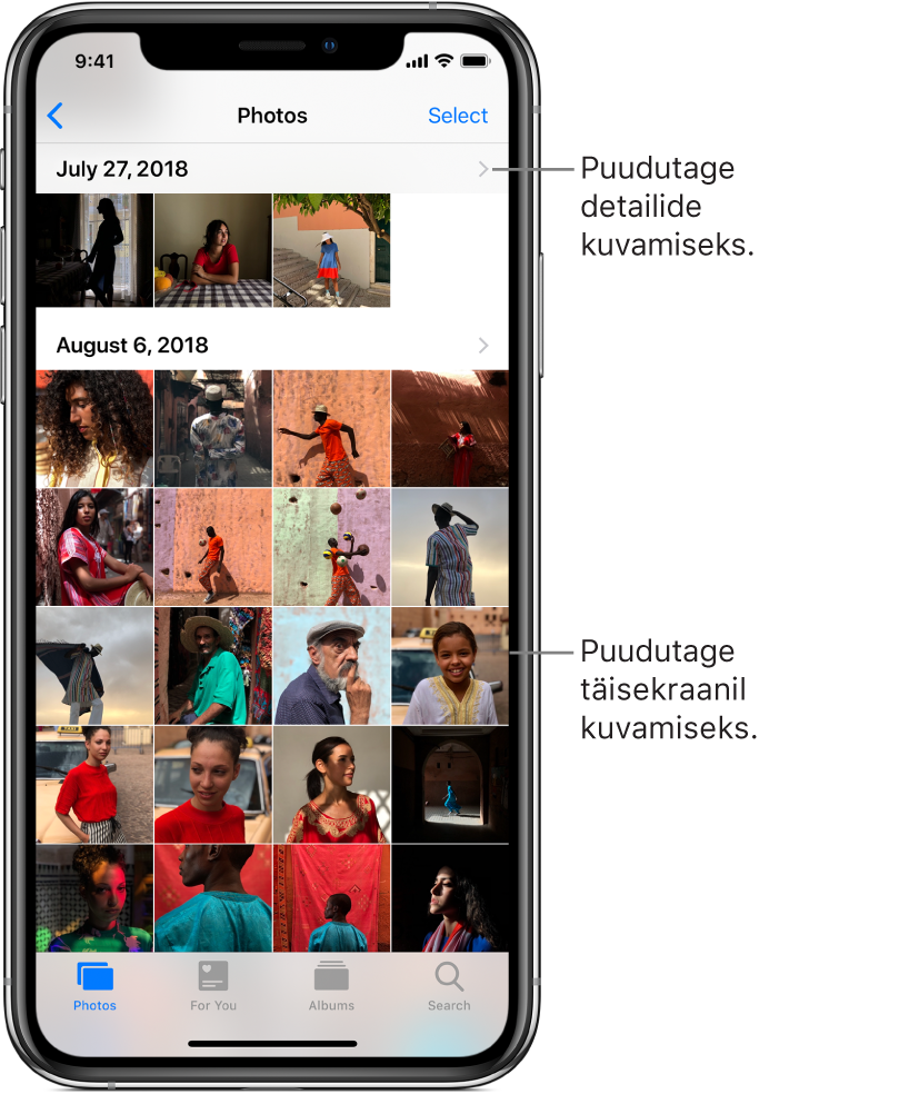 Rakendus Photos, mille ekraani alaservas asuvad (vasakult paremale) vahekaardid Photos, For You, Albums ja Search. Valitud on vahekaart Photos ning ülaltoodud kuvas on fotode pisipiltide võrgustik, mis on korrastatud hetkede alusel gruppidesse. Iga hetke kohal on fotode tegemise kuupäev. Hetke kohta üksikasjade kuvamiseks puudutage kuupäeva. Foto täisekraanil kuvamiseks puudutage selle pisipilti.