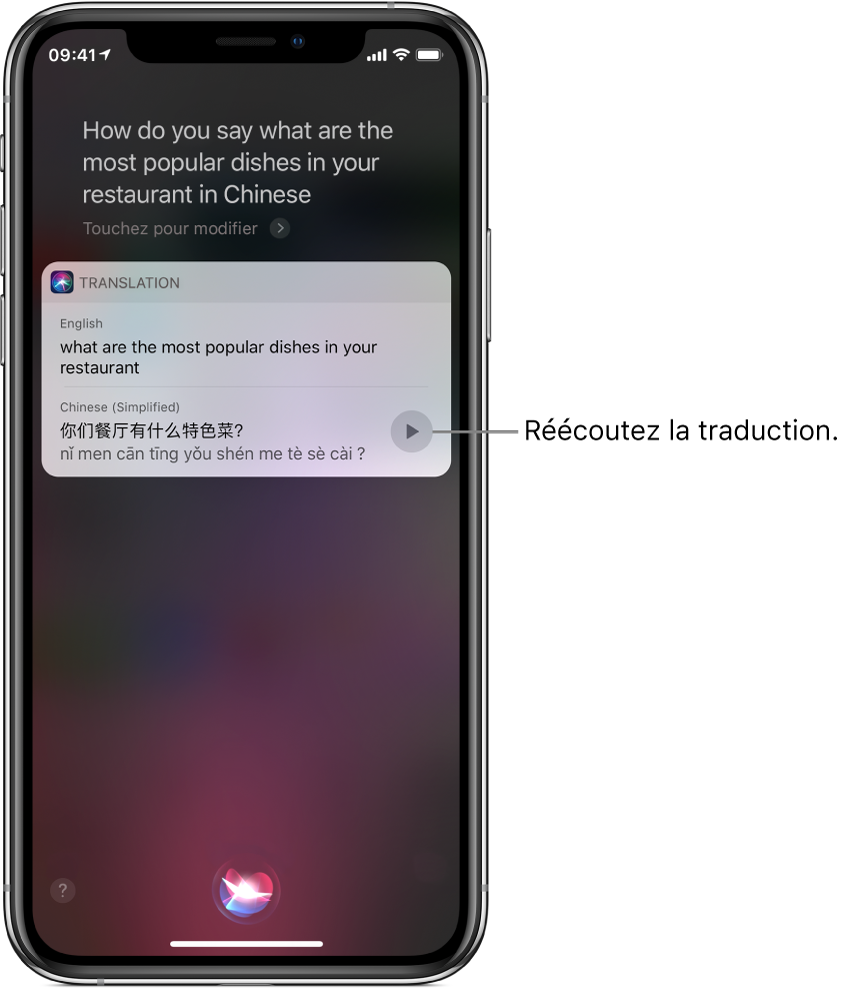 En réponse à la question “Dis “C’est délicieux” en chinois.” Siri affiche une traduction chinoise de la phrase française “C’est délicieux”. Un bouton situé à droite de la traduction relance l’audio de la traduction.