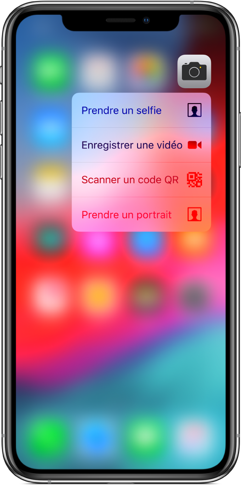 L’écran d’accueil flouté, avec le menu des actions rapides de l’appareil photo s’affichant sous l’icône de l’appareil photo.