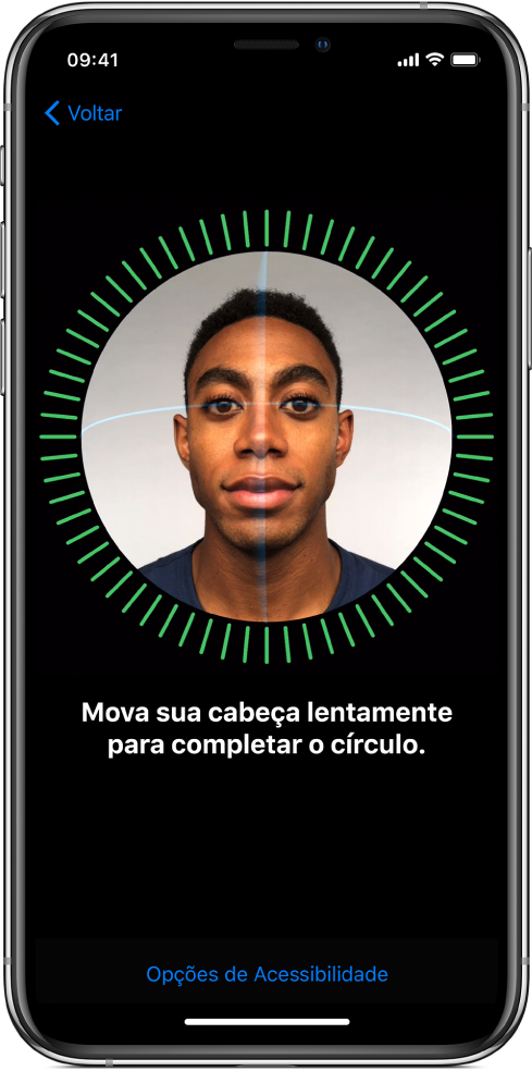 Tela de configuração do reconhecimento do Face ID. Um rosto é mostrado na tela, envolto por um círculo. Abaixo disso, um texto instrui a mover a cabeça lentamente para completar o círculo.