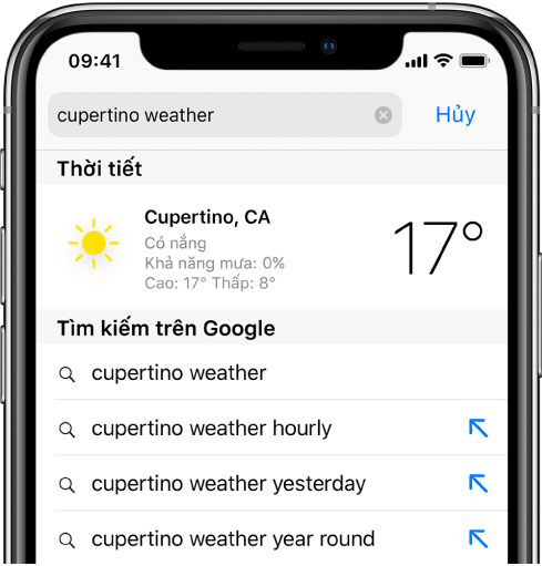 Ở đầu màn hình là trường tìm kiếm của Safari, chứa văn bản “thời tiết tại cupertino”. Bên dưới trường tìm kiếm là một kết quả từ ứng dụng Thời tiết cho biết nhiệt độ và thời tiết hiện tại cho Cupertino. Bên dưới đó là các kết quả của Tìm kiếm trên Google, bao gồm “thời tiết tại cupertino”, “thời tiết hàng giờ tại cupertino”, “thời tiết hôm qua tại cupertino” và “thời tiết cả năm tại cupertino”. Ở phía bên phải của từng kết quả là mũi tên màu lam để liên kết đến trang kết quả tìm kiếm cụ thể.