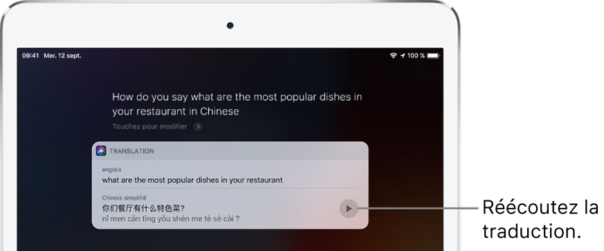 En réponse à la question “Dis “C’est délicieux” en chinois.” Siri affiche une traduction chinoise de la phrase française “C’est délicieux”. Un bouton situé à droite de la traduction relance l’audio de la traduction.