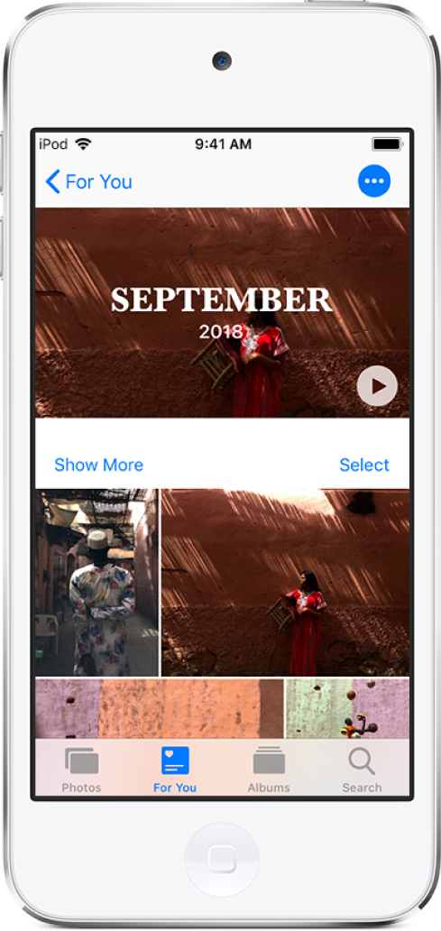 Layar Memori menampilkan video di bagian atas. Di bawah video terdapat koleksi foto.
