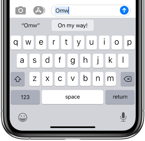 A message with the text shortcut OMW typed and “On my way!” suggested below as replacement text.