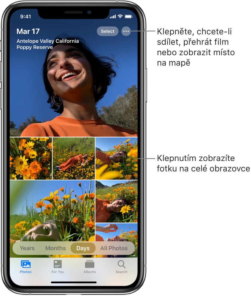 Knihovna fotek v zobrazení Dny. Obrazovka je zaplněna výběrem miniatur fotografií. Vlevo nahoře na obrazovce je vždy uvedeno datum a místo pořízení fotky. Vpravo nahoře jsou vidět tlačítka Vybrat a Další volby pro sdílení fotek a zobrazení podrobností. Pod miniaturami se nacházejí volby pro zobrazení knihovny fotek s uspořádáním Roky, Měsíce, Dny nebo Všechny fotky. Podél dolního okraje jsou vidět panely Fotografie, Pro vás, Alba a Hledat