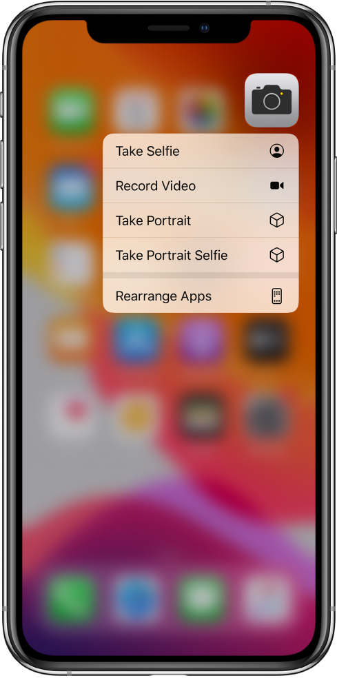 The Home screen blurred, with the Camera quick actions menu showing below the Camera icon.