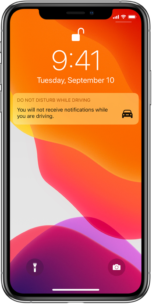The Do Not Disturb While Driving notification on the Lock screen.