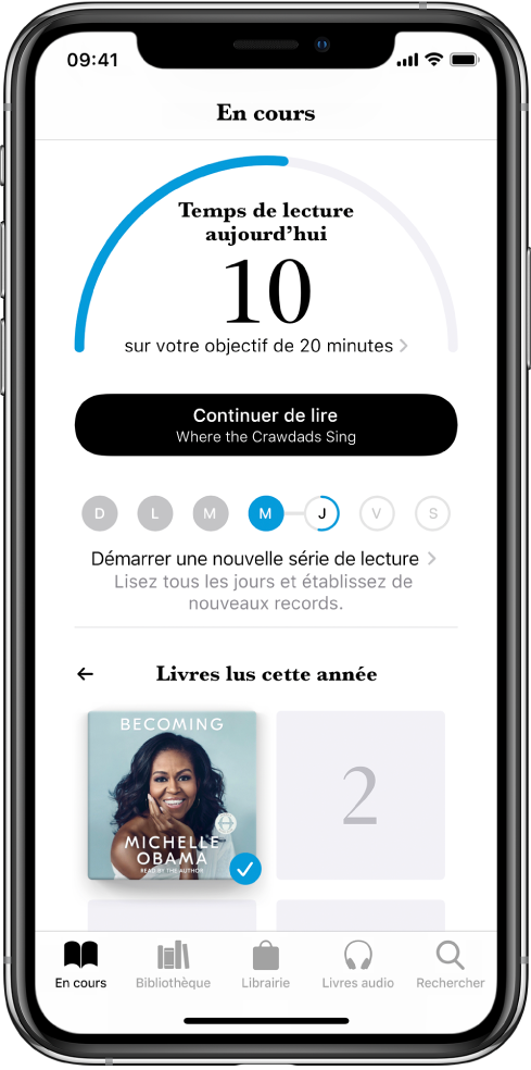 La section « Objectifs de lecture » dans « En cours ». Le compteur de lecture indique que 10 minutes ont été réalisées sur un objectif de 20 minutes. Sous le compteur se trouve un bouton « Continuez la lecture » et des cercles qui montrent les jours de la semaine, du dimanche au samedi. Un contour bleu autour d’un cercle indique la progression de la lecture pour ce jour. Au bas de la page se trouvent les couvertures des livres lus cette année.
