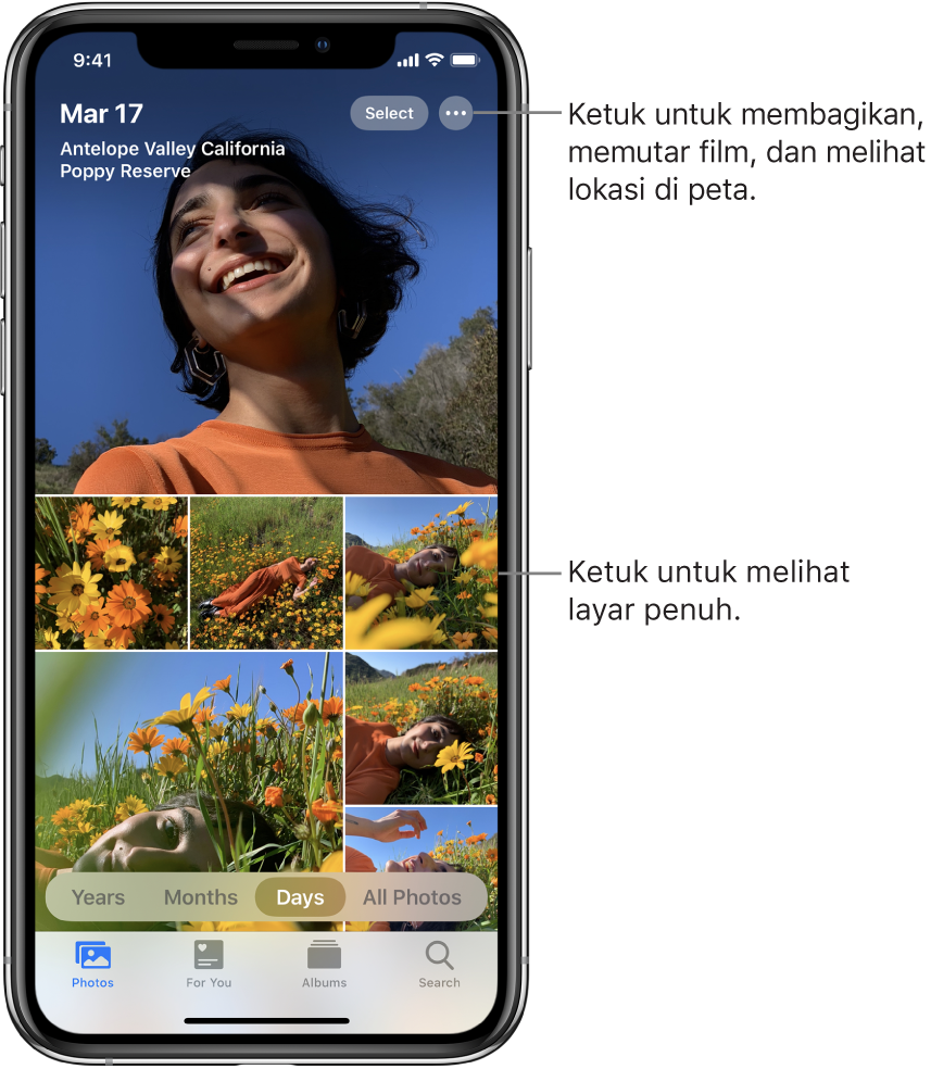 Perpustakaan foto ditampilkan dalam tampilan Hari. Pilihan gambar mini foto mengisi layar. Di kiri atas layar terdapat tanggal dan lokasi tempat foto ambil. Di kanan atas terdapat tombol Pilih dan Pilihan Lainnya untuk membagikan foto serta melihat detail. Di bawah gambar mini terdapat pilihan untuk melihat perpustakaan foto menurut Tahun, Bulan, Hari, dan Semua Foto. Di sepanjang bagian bawah terdapat tab Foto, Untuk Anda, Album, dan Cari.