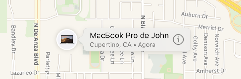 Um grande plano do ícone de informações do MacBook Pro do João.