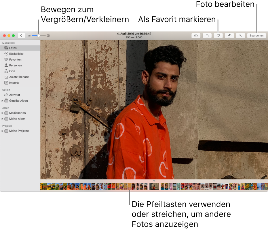 Das Fenster „Fotos“ mit einem vergrößert dargestellten Foto rechts und einer Reihe von Miniaturen darunter. Die Symbolleiste oben umfasst den Zoomregler und die Tasten „Favorit“ und „Bearbeiten“.