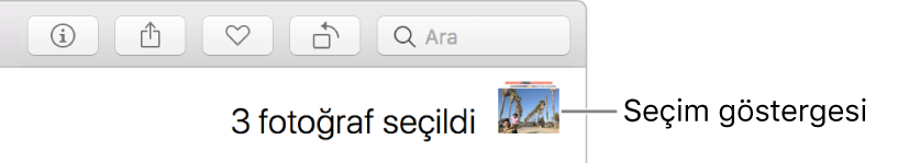 Seçili üç fotoğraf olduğunu gösteren bir seçim göstergesi.