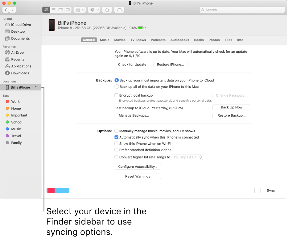 A device selected in the Finder sidebar and syncing options appearing in the window.