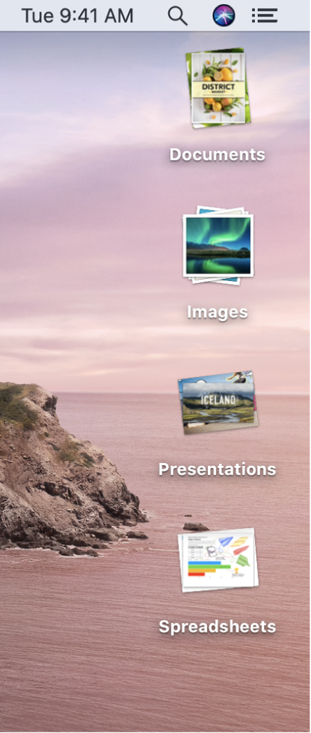Le bureau d’un Mac avec quatre piles, pour les documents, les images, les présentations et les feuilles de calcul, sur le côté droit de l’écran.