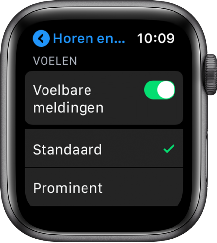 Instellingen voor horen en voelen op de Apple Watch, met de schakelaar 'Voelbare meldingen' en daaronder de opties 'Standaard' en 'Prominent'.