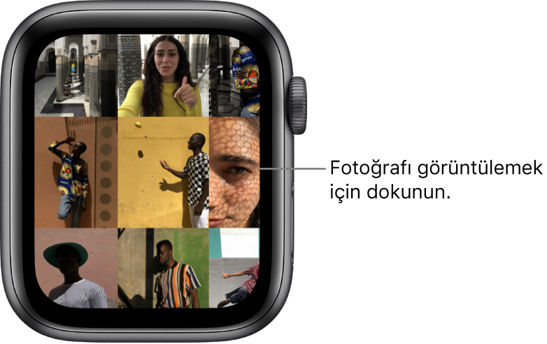 Bir ızgarada görüntülenen çok sayıda fotoğrafla birlikte Apple Watch Fotoğraflar uygulamasının ana ekranı.