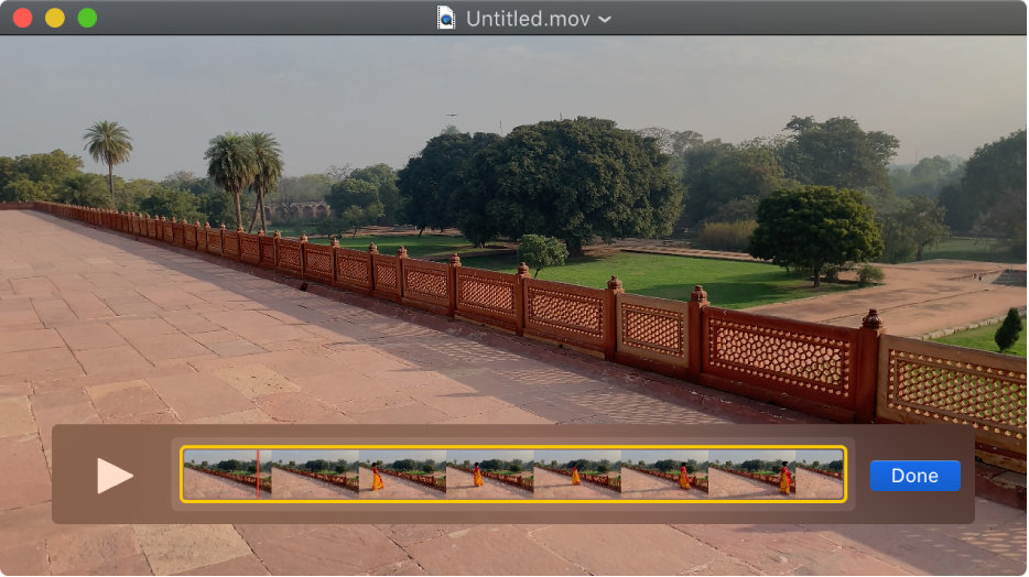 The QuickTime Player window with the clip editor showing at the bottom.