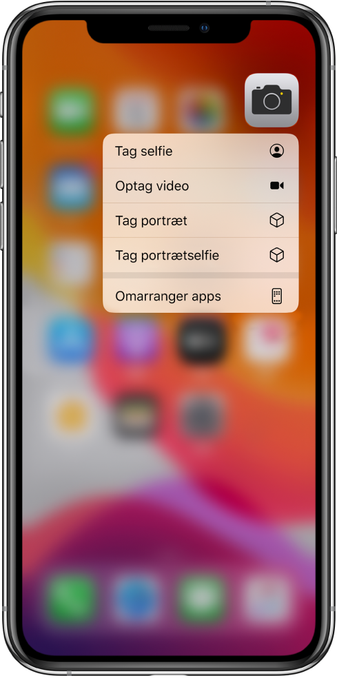 Hjemmeskærmen er sløret, med menuen med hurtige handlinger til Kamera vist under appen Kamera.