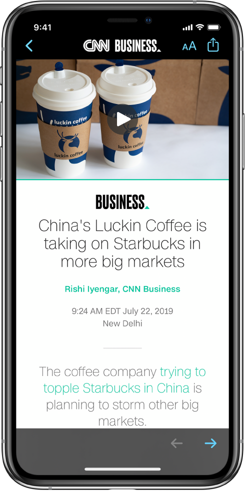 An article from Apple News. At the top-left of the screen is the Back button to return to the Stocks app. At the top-right corner of the screen are the Text Format and Share buttons. At the bottom-right corner is the Next Page button.