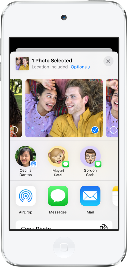 The Sharing screen with photos across the top; one photo is selected, indicated with a white checkmark in a blue circle. The row beneath the photos shows friends you can share with using AirDrop. Below that are other sharing options, including, from left to right, Messages, Mail, Shared Albums, and Add to Notes. In the bottom row are the Copy, Copy iCloud Link, Slideshow, and AirPlay buttons.