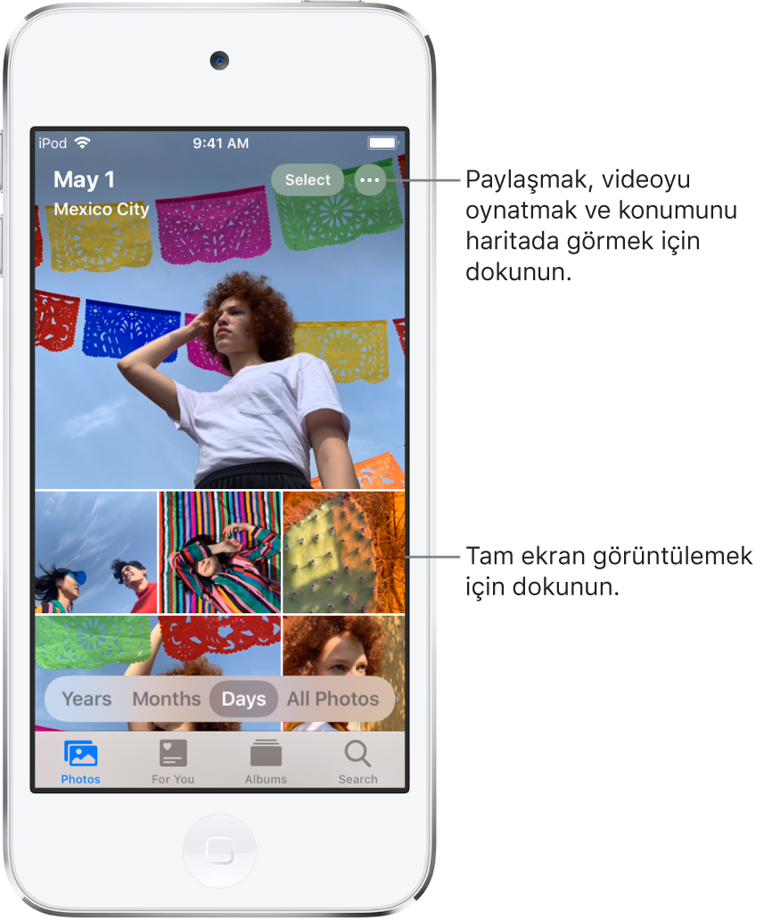 Günler görünümünde gösterilen fotoğraf arşivi. Bir fotoğraf seçkisinin küçük resimleri ekranı dolduruyor. Ekranın sol üstünde fotoğrafların seçildiği tarih ve yer var. Sağ üstte Seç ve Daha Fazla Seçenek düğmeleri var. Küçük resimlerin altında fotoğraf arşivini Yıl’a, Ay’a, Gün’e göre ve Tüm Fotoğraflar’ı görüntüleme seçenekleri var. Alt kısımda Fotoğraflar, Sizin İçin,Albümler ve Ara sekmeleri var.