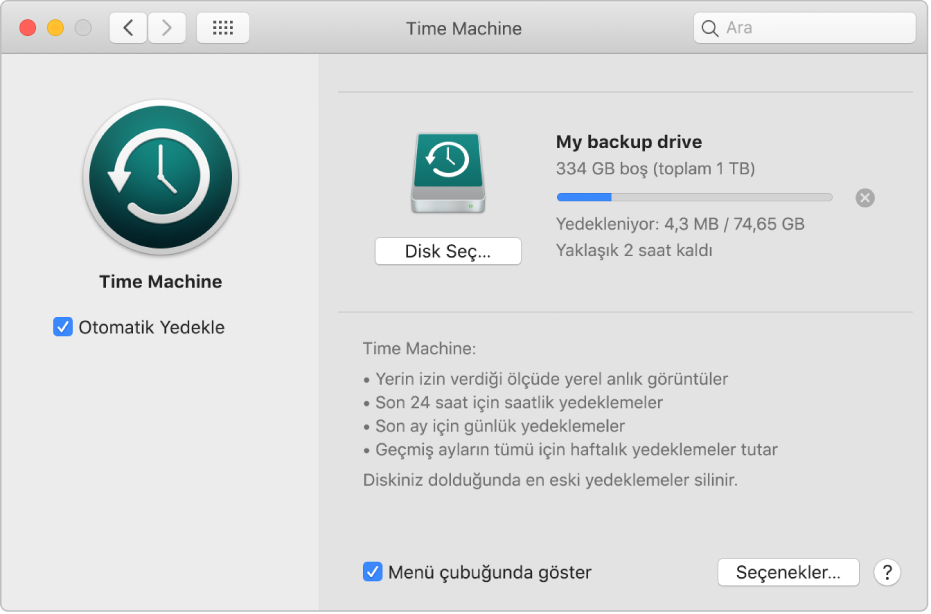 Harici bir sürücüye yedeklemenin ilerleme durumunu gösteren Time Machine tercihleri.