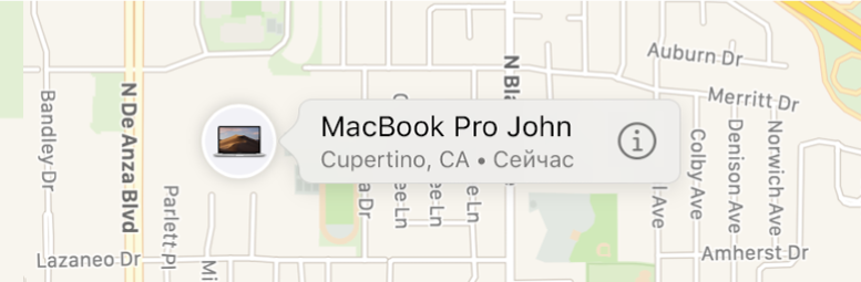 Значок «Информация» крупным планом на MacBook Pro.