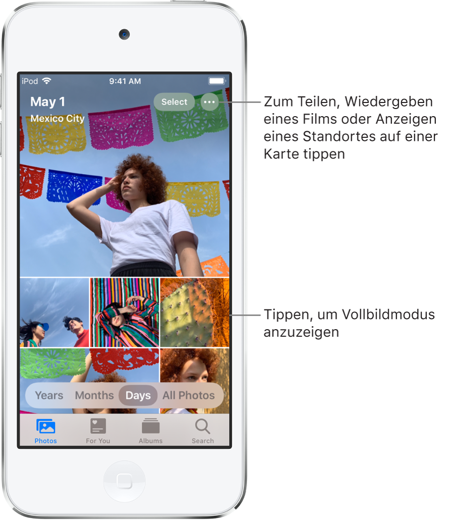 Die Fotomediathek in der Tagesansicht. Eine Auswahl mit Fotominiaturen füllt den Bildschirm. Oben links wird angezeigt, wann und wo die Fotos aufgenommen wurden. Oben rechts befinden sich die Tasten „Auswählen“ und „Weitere Optionen“. Unter den Miniaturen befinden Optionen zum Anzeigen aller Fotos in der Fotomediathek oder unterteilt nach Jahren, Monaten oder Tagen. Ganz unten befinden sich die Tabs „Fotos“, „Für dich“, „Alben“ und „Suchen“.
