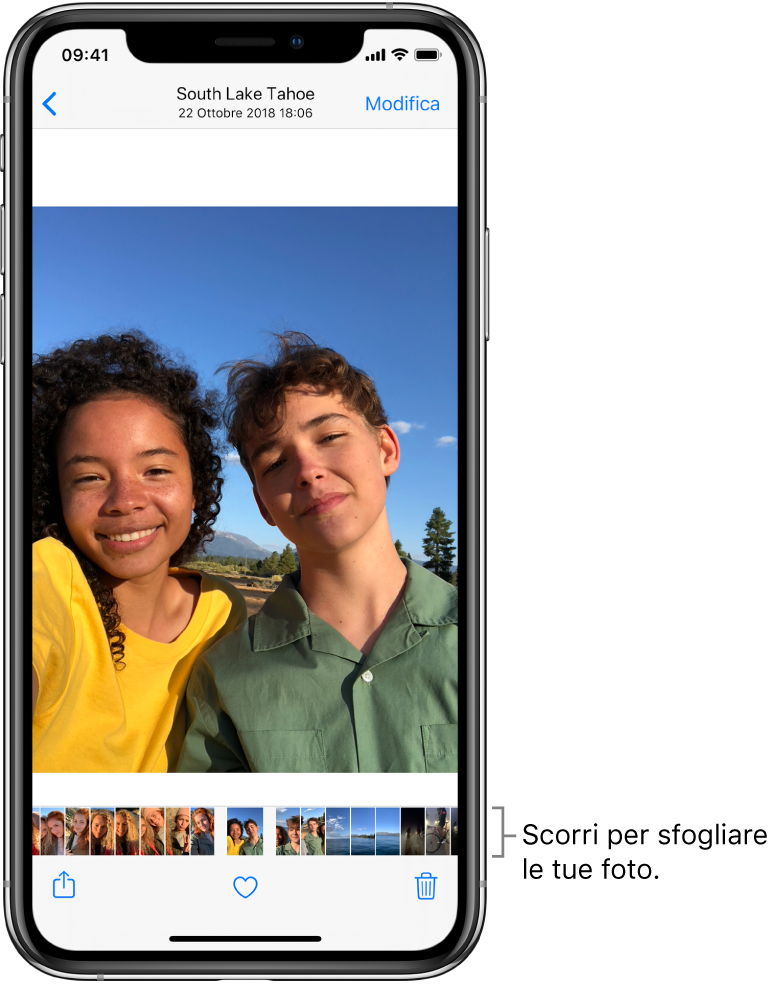 Una foto con miniature di altre foto nella parte inferiore dello schermo. In alto a sinistra è presente un pulsante Indietro, che ti riporta al pannello in cui stavi sfogliando i file. Lungo la parte inferiore dello schermo sono presenti i pulsanti Condividi, “Mi piace” ed Elimina. In alto a destra è presente il pulsante Modifica.