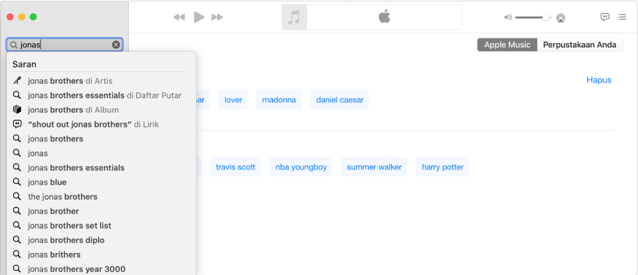 Layar Musik menampilkan Apple Music dipilih di pojok kanan atas, dan “Jonas” dimasukkan di bidang pencarian di pojok kiri atas. Hasil Apple Music yang disarankan untuk “Jonas” ditampilkan di daftar di bawah bidang pencarian.