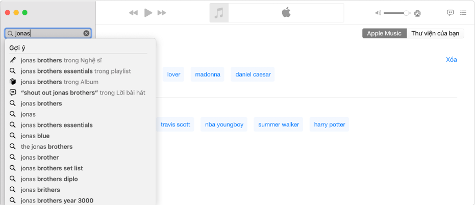 Màn hình Nhạc đang hiển thị Apple Music được chọn ở góc trên cùng bên phải và “Jonas” được nhập vào trường tìm kiếm ở góc trên cùng bên trái. Các kết quả được gợi ý của Apple Music cho “Jonas” được hiển thị trong danh sách bên dưới trường tìm kiếm.